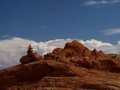 Cairn with clouds