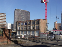 Cranes at the Hotel La Tour site, Island House and the McLaren Building