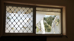 Smashed bathroom window in Bentley Perth