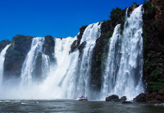 Iguazu waterfall up close with a boat for scale