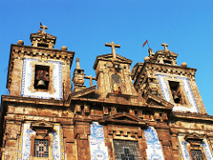 Against the bright blue sky