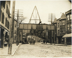 Washington Street just north of Bartlett Street, setting up traveller